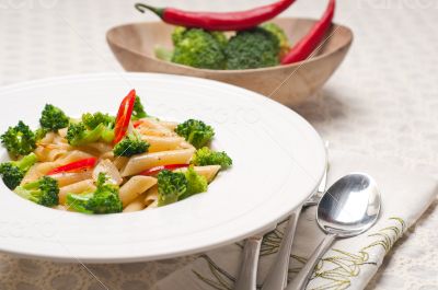 Italian penne pasta with broccoli and chili pepper