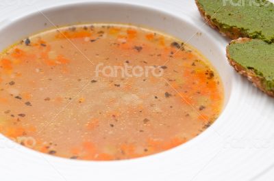 Italian minestrone soup with pesto crostini on side