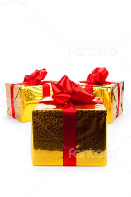 Three gold gift boxes