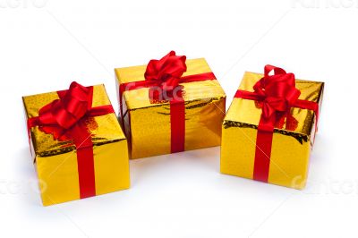 Three gold gift boxes