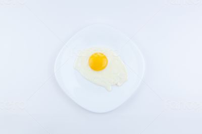 white plate with scrambled eggs