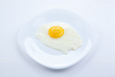 white plate with scrambled eggs