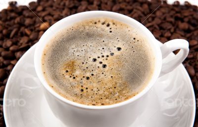 cup of black coffee with foam