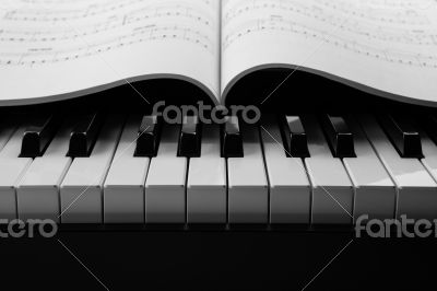 Piano keys and musical book