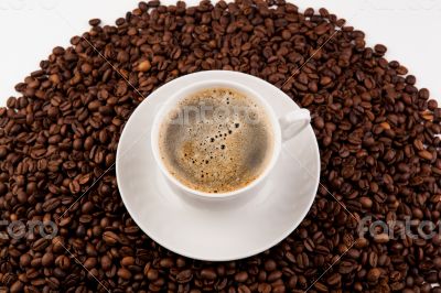 cup of black coffee with foam
