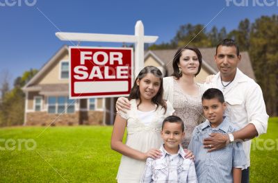 Hispanic Family, New Home and For Sale Real Estate Sign