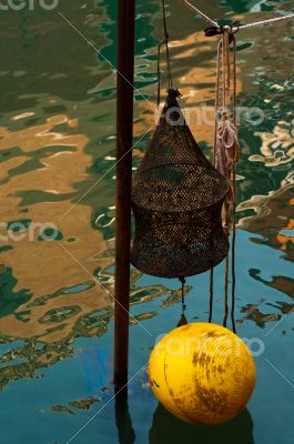 Venice Italy fishing gear on canal