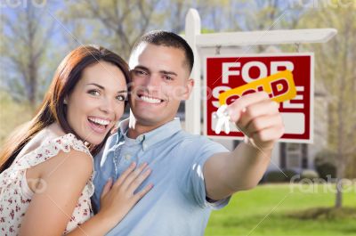 Military Couple In Front of Home, House Keys and Sign