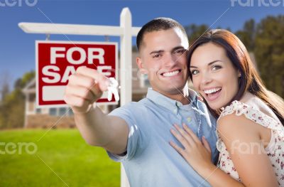 Military Couple In Front of Home, House Keys and Sign