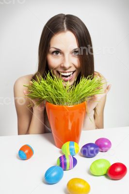 Girl and painted eggs
