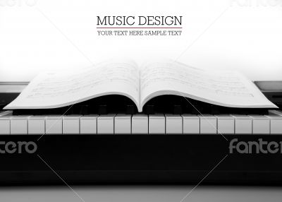 Piano keys and musical book