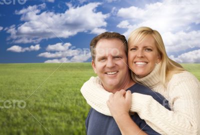 Happy Attractive Couple Hugging at the Park