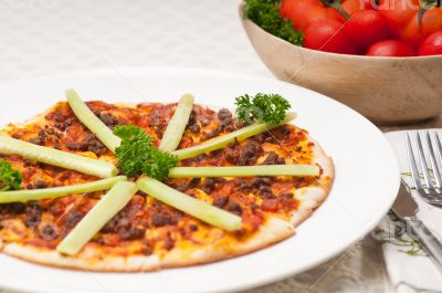 Turkish beef pizza with cucumber on top