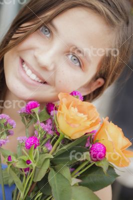 Pretty Young Girl Holding Flower Bouquet at the Market