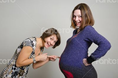 Pregnant woman and girfriend