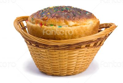 Easter bread in a basket on a white background