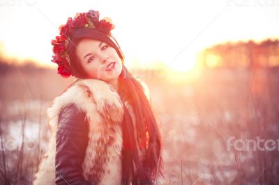 Young woman in fur vest