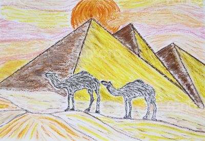 Two camels standing in front of the pyramids 