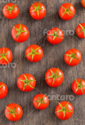 cherry tomatoes on vintage wooden table