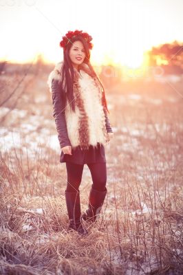 Young woman in fur vest