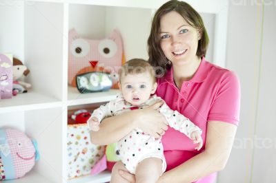 Mother and baby in playroom