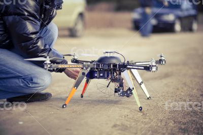 Quadrocopter drone ready to takeoff