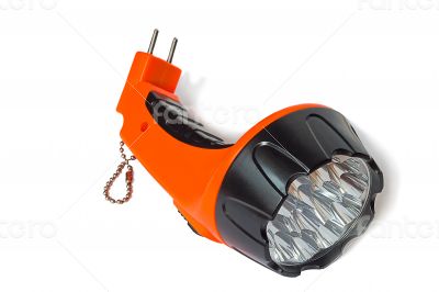 Electric rechargeable led flashlight on a white background.