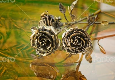 The shiny metal forged roses, handmade