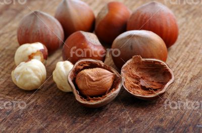 Hazelnuts, filbert on old wooden background 