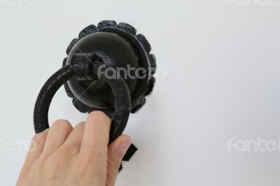 Doorknob with female hand