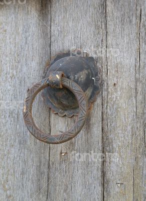 Rusted doorknob on the old tunisian door