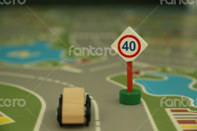 mini wooden road sign `speed limit 40`