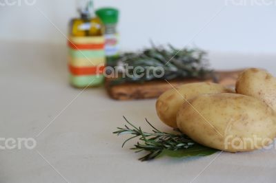 Fresh potatoes, rosemary, bay leaf