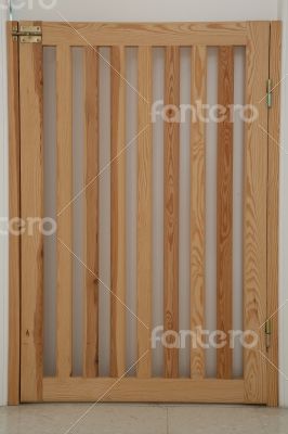 Wooden security door for babies and small children