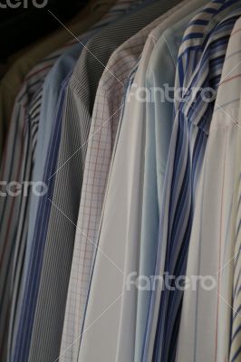 businessman`s hanging shirts