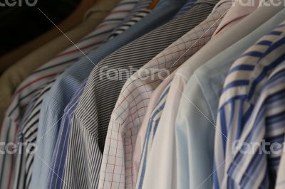 Hanging shirts of businessman