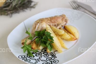 Chicken with potatoes and fresh parsley