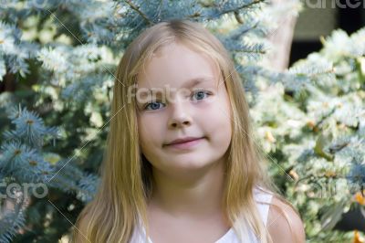 Girl with blond hair and blue eyes