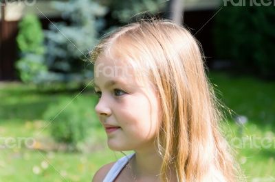 Cute girl with gold hair