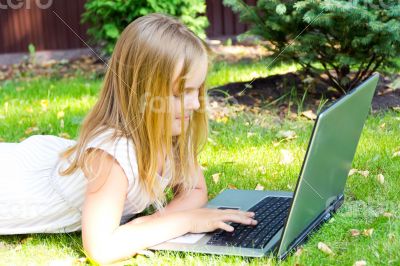 Cute girl with laptop