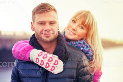 Woman in lovely mittens and her boyfriend