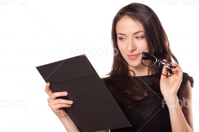 Teacher in glasses with clipboard