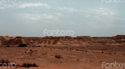 An Egyptian Desert And Mysty Sky in the daylight