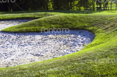 Sand bunkers on the golf course.