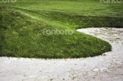 Sand bunkers on the golf course.