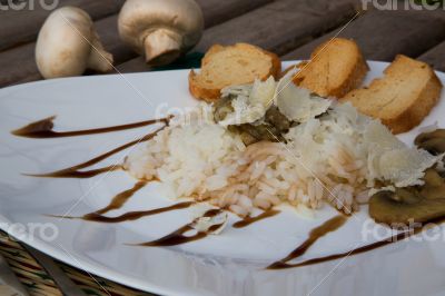 Rice with stewed mushrooms and parmesan
