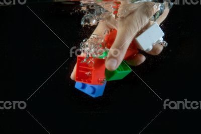 Toys dropped into water