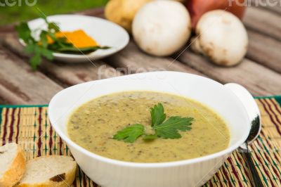 Mushroom cream soup in the white plate