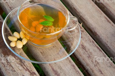 Traditional tunisian green tea with peppermint and nuts