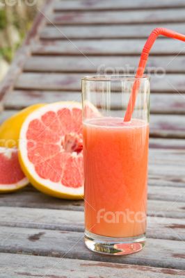 A glass of fresh grapefruit  juice